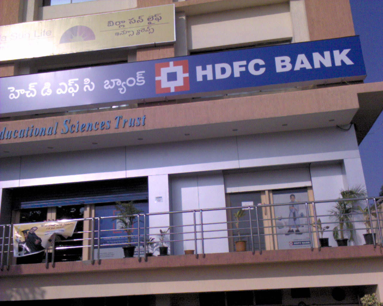 Indian credit cards on a wooden table representing HDFC Bank reward changes